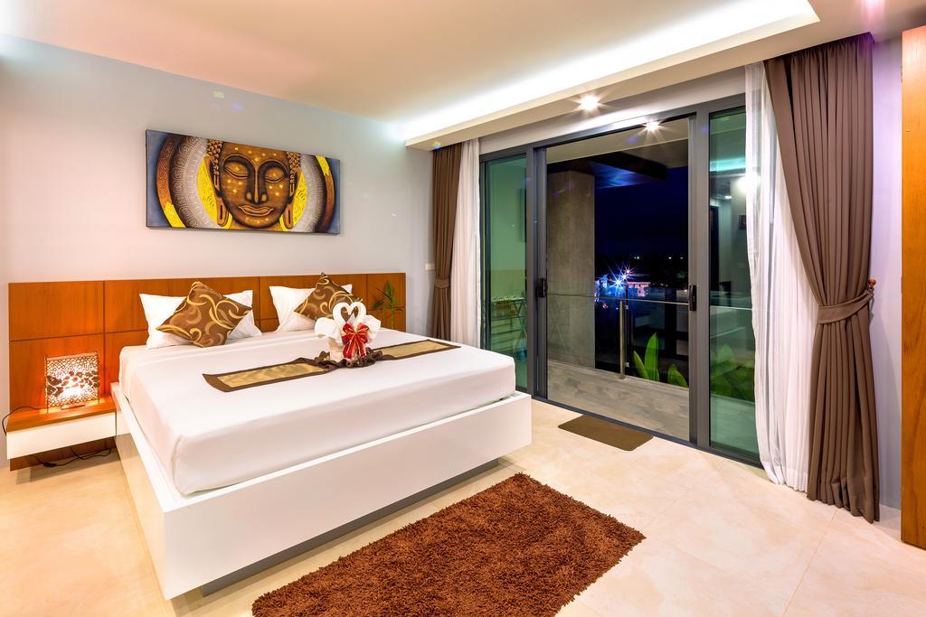 Aparthotel At The Tree Phuket à Rawai Chambre photo
